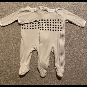 Two Nanit pajama breath wear